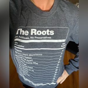 The Roots sweatshirt, never worn. Size Medium.